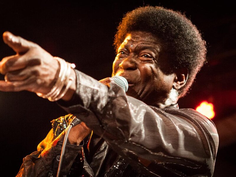 Man Singing into Microphone — Black, Dramatic, Night, Photograph, Jacket