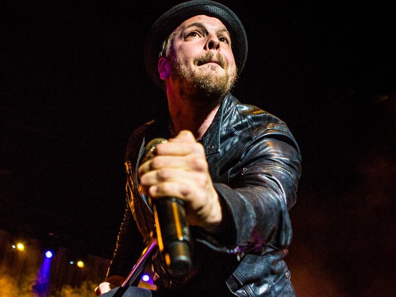Man Singing into Microphone — Black, Dramatic, Night, Photograph, Leather Jacket