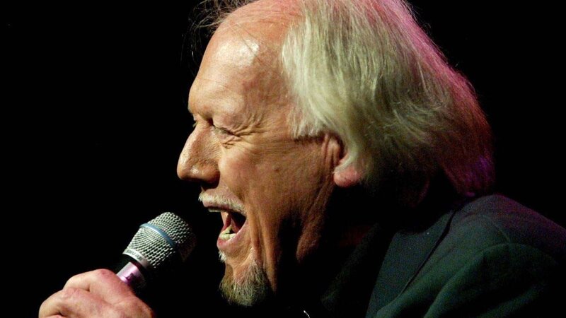 Man Singing into Microphone — Black, Dramatic, Photograph, Hair, Beard