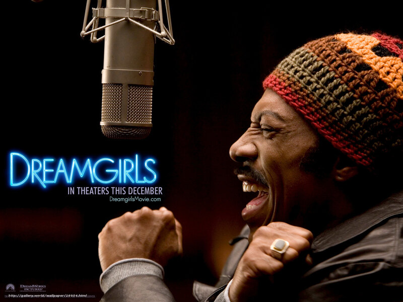 Man Singing into Microphone — Black, Dramatic, Photograph, Knit Hat