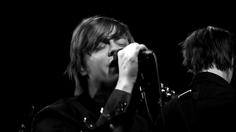 Man Singing into Microphone — Black, Dramatic, Photograph, Person