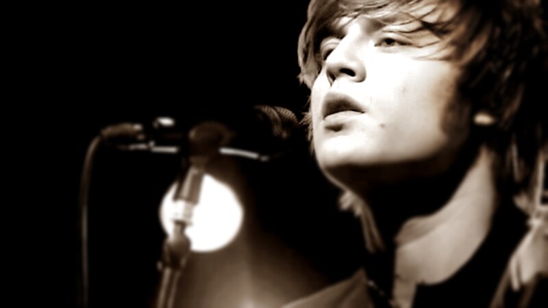 Man Singing into Microphone — Black, Dramatic, Photograph, Stage Light
