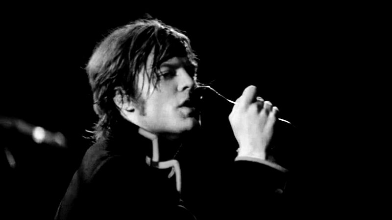Man Singing into Microphone — Black, Dramatic, Photograph