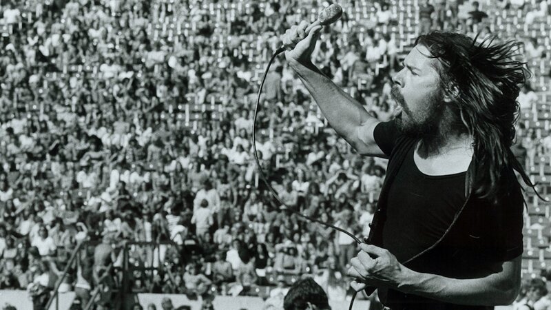 Man Singing into Microphone — Black, Energetic, Afternoon