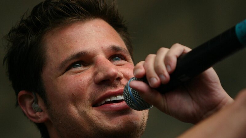 Man Singing into Microphone — Black, Focused, Photograph