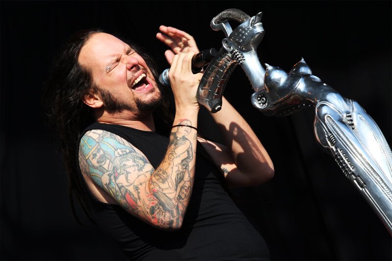 Man Singing into Microphone — Black, Intense, Afternoon