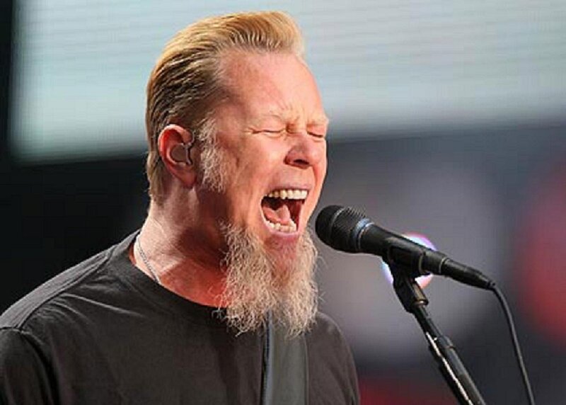Man Singing into Microphone — Black, Intense, Photograph, Earpiece