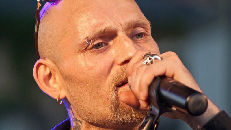 Man Singing into Microphone — Black, Intense, Photograph, Sunglasses