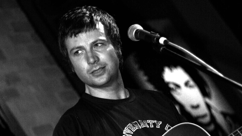 Man Singing into Microphone — Black, Intimate, Night