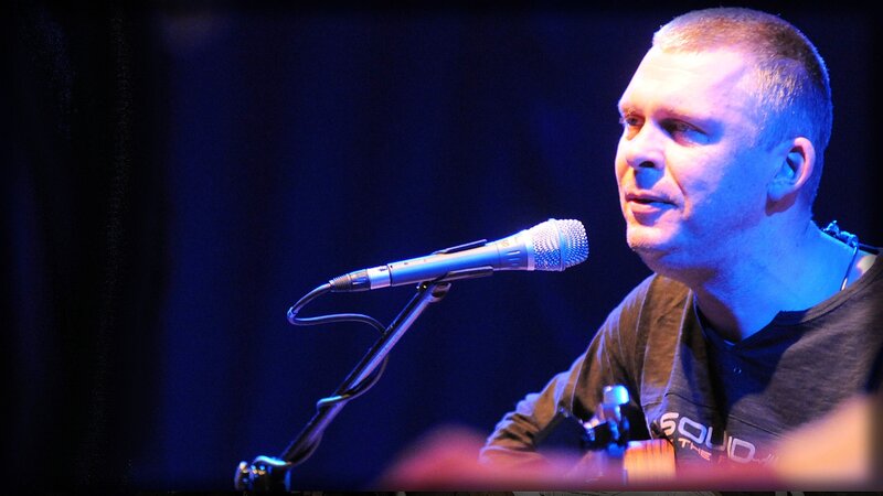 Man Singing into Microphone — Blue, Dramatic, Night, Photograph