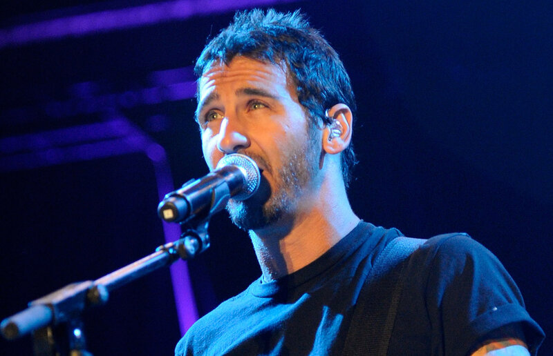 Man Singing into Microphone — Blue, Dramatic, Night
