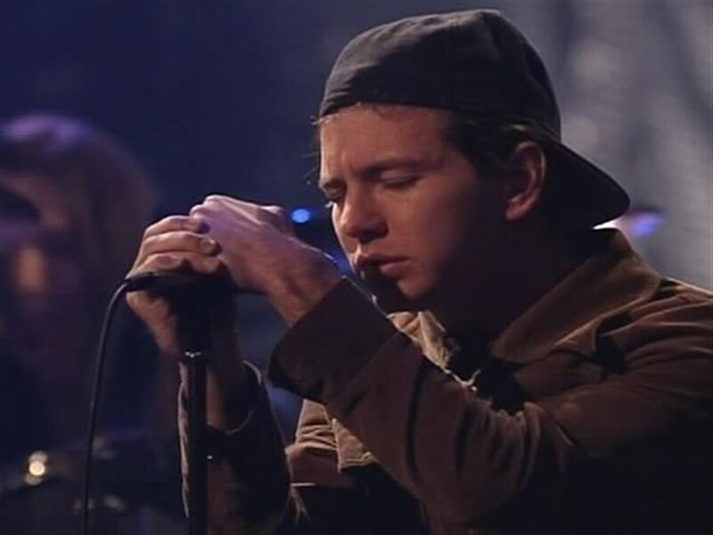 Man Singing into Microphone — Brown, Intense