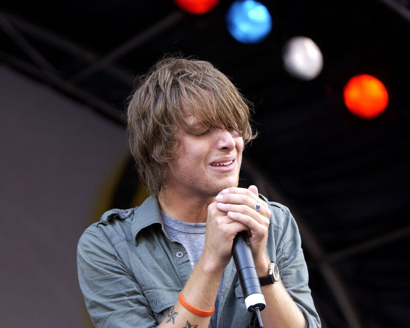 Man Singing into Microphone — Gray, Energetic