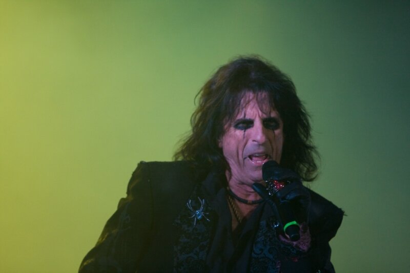 Man Singing into Microphone — Green, Dramatic