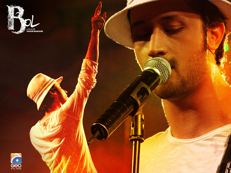 Man Singing into Microphone — Orange, Dramatic