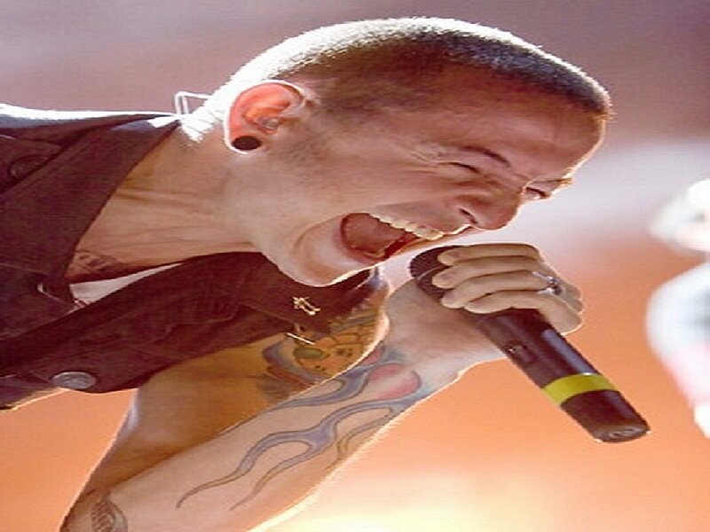 Man Singing into Microphone — Orange, Intense