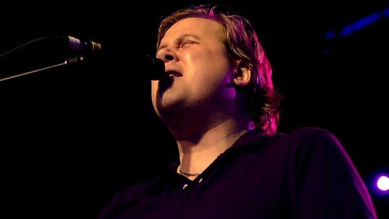 Man Singing into Microphone — Purple, Dramatic, Night, Photograph, Stage Lights