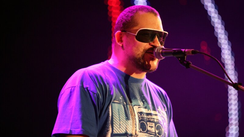 Man Singing into Microphone — Purple, Dramatic, Night, Photograph, Sunglasses