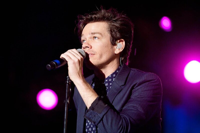 Man Singing into Microphone — Purple, Dramatic, Night