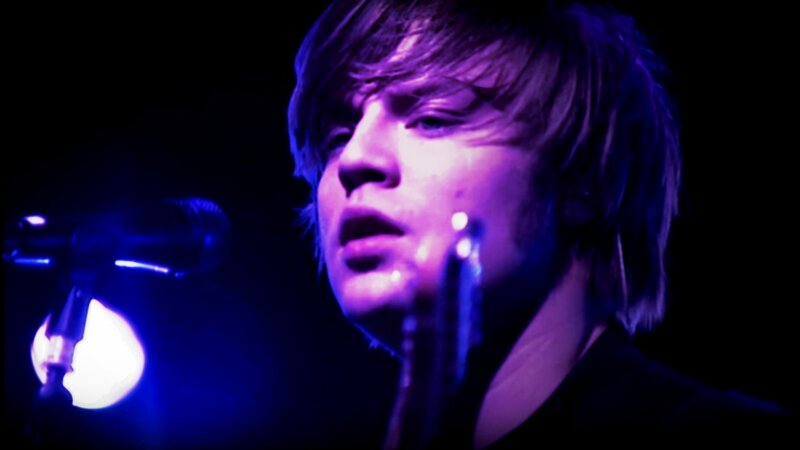 Man Singing into Microphone — Purple, Dramatic