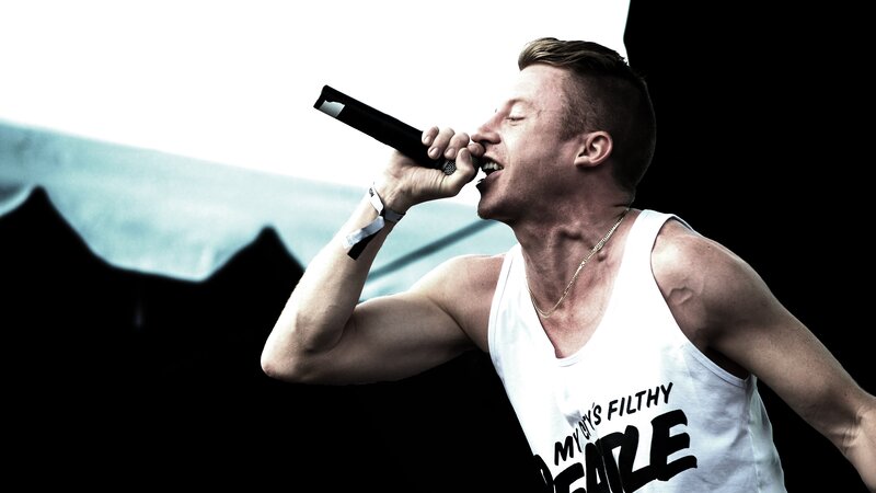 Man Singing into Microphone — White, Dramatic, Photograph