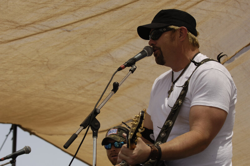 Man Singing into Microphone — White