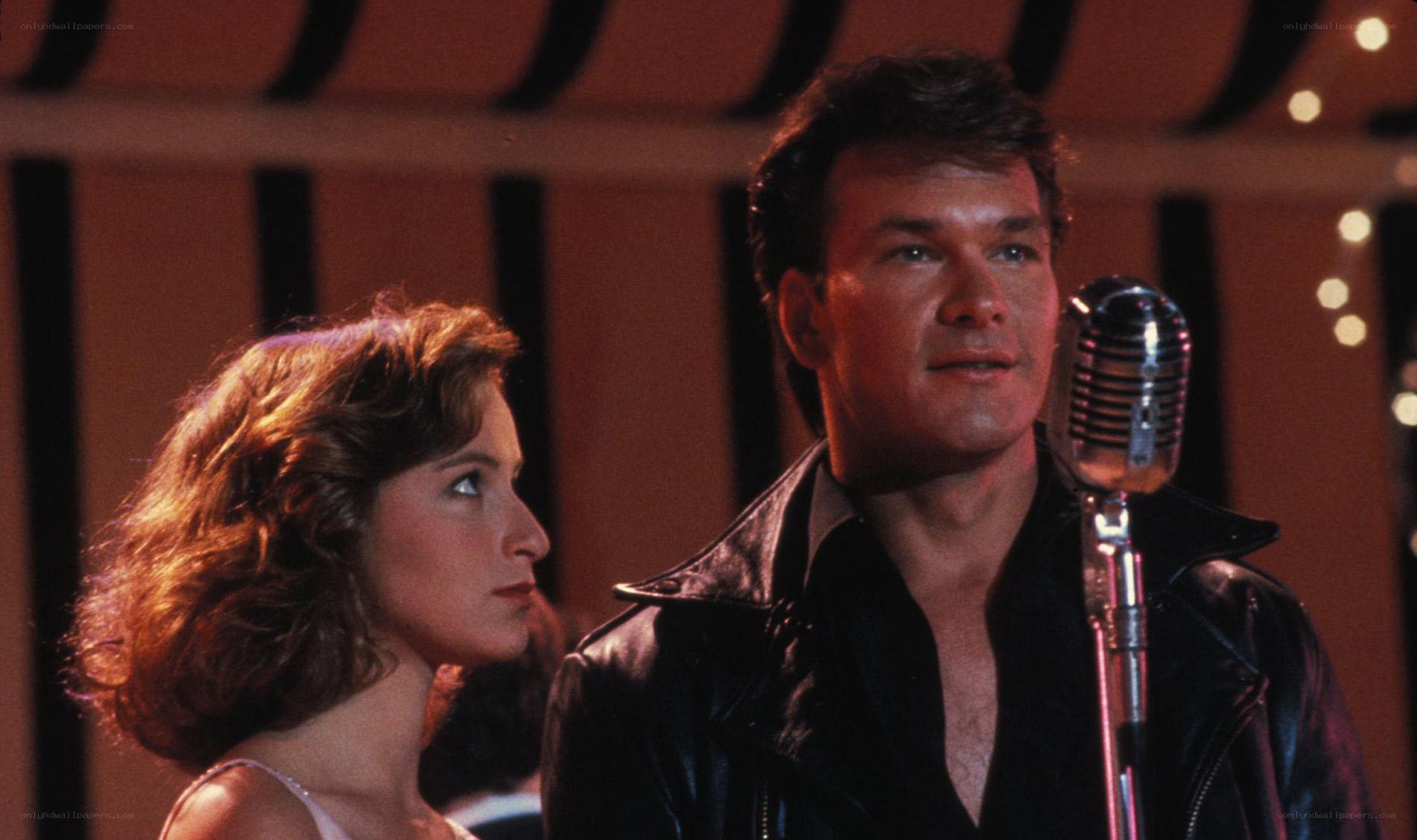 Man singing into vintage microphone
