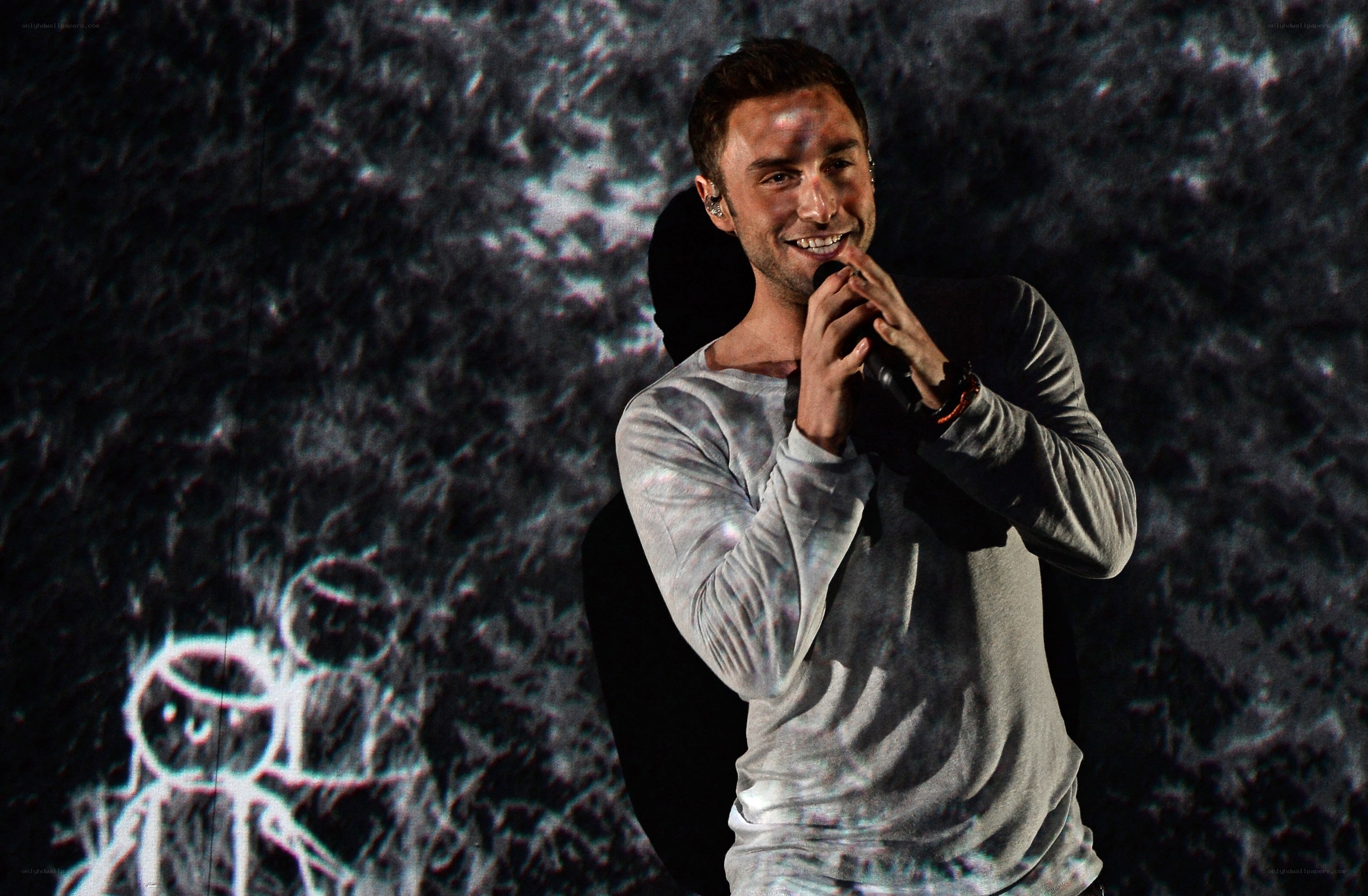 Man singing on stage