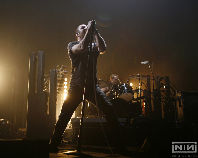 Man Singing on Stage — Black, Dramatic, Night, Photograph, Drummer, Microphone Stand