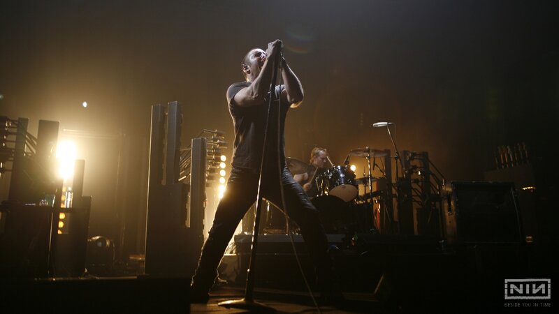 Man Singing on Stage — Black, Dramatic, Night, Photograph, Drummer