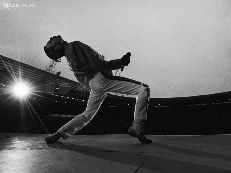 Man Singing on Stage — Black, Dramatic, Night, Photograph, Microphone, Stadium