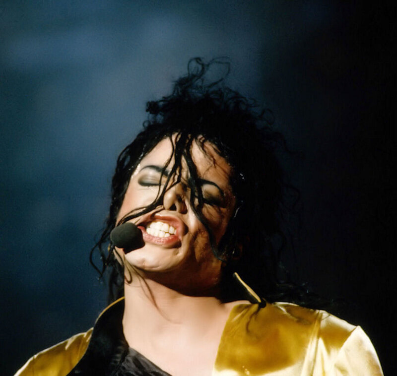 Man Singing on Stage — Black, Dramatic, Photograph, Microphone