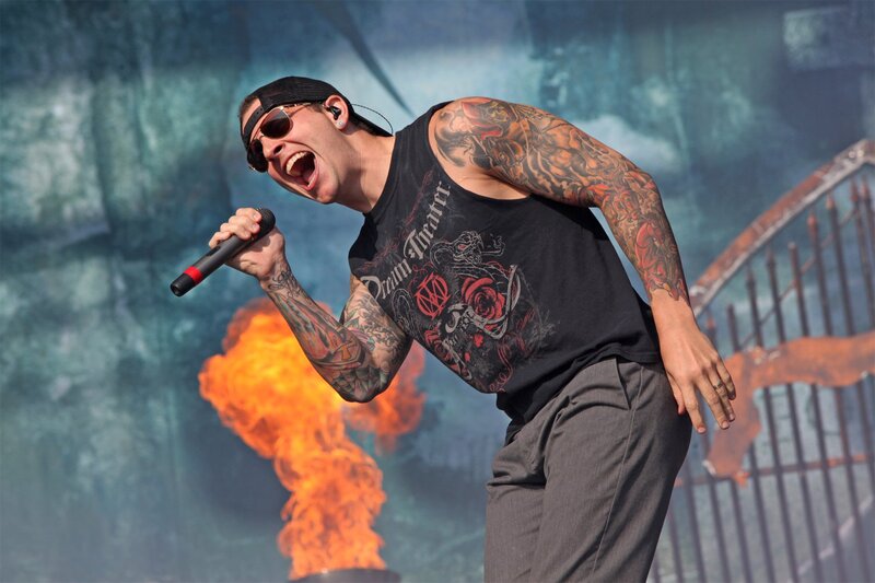 Man Singing on Stage — Black, Dramatic, Photograph