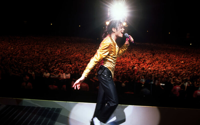 Man Singing on Stage — Black, Energetic, Night, Photograph, Crowd
