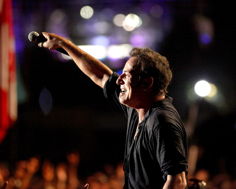 Man Singing on Stage — Black, Energetic, Night