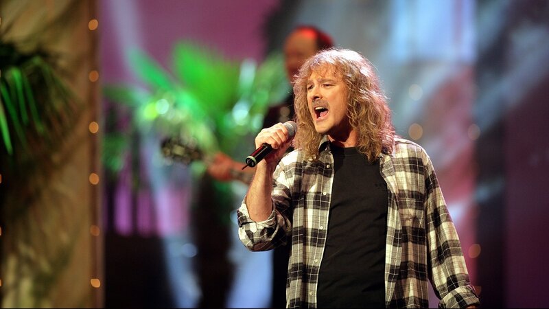 Man Singing on Stage — Black, Energetic, Photograph, Microphone