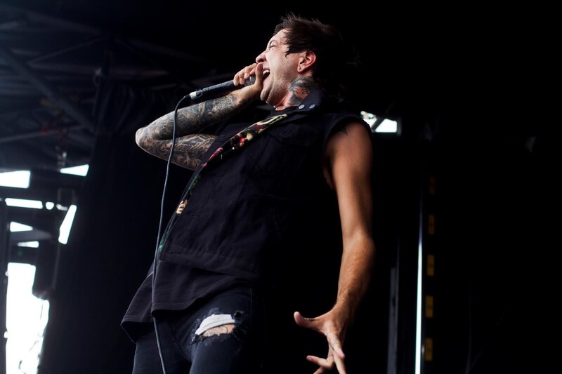 Man Singing on Stage — Black, Intense, Photograph