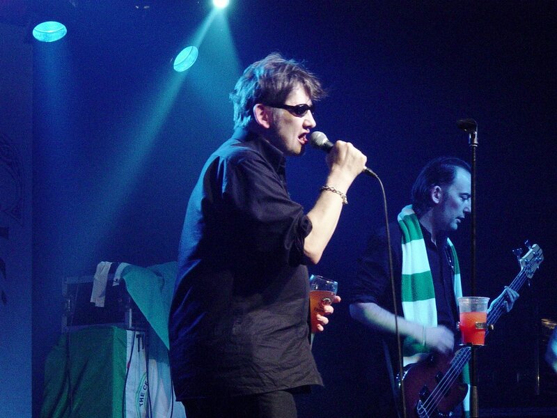 Man Singing on Stage — Blue, Dark
