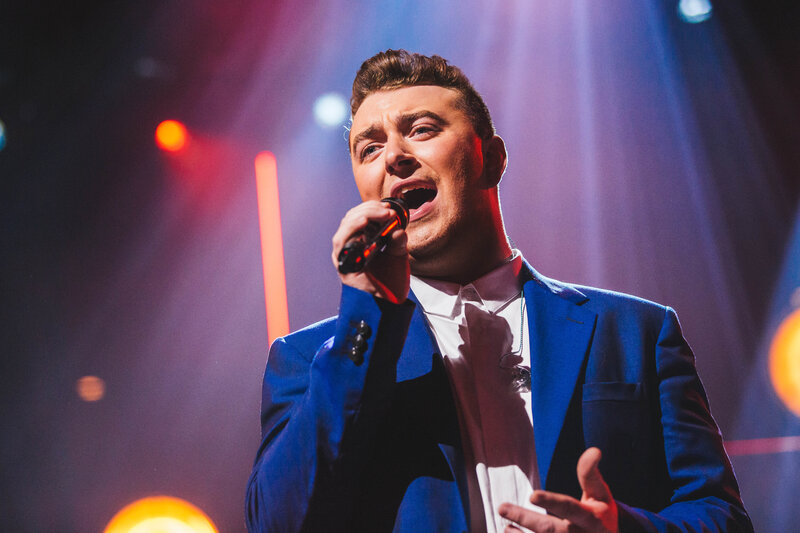 Man Singing on Stage — Blue, Dramatic, Night, Photograph, Microphone, Suit