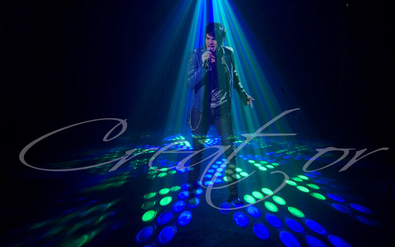 Man Singing on Stage — Blue, Dramatic, Night, Photograph