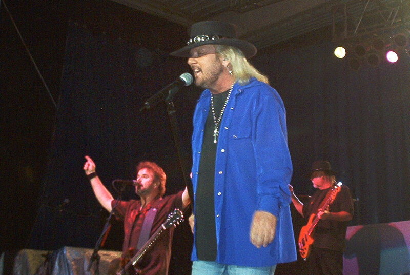Man Singing on Stage — Blue, Energetic