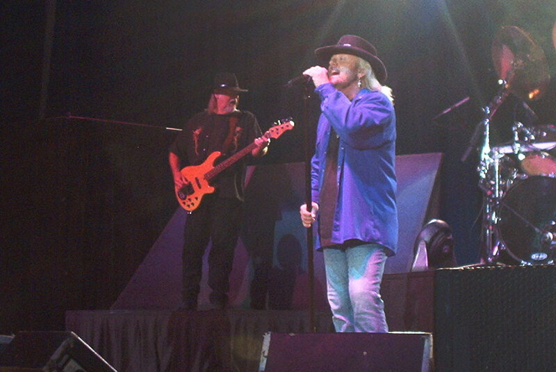 Man Singing on Stage — Blue