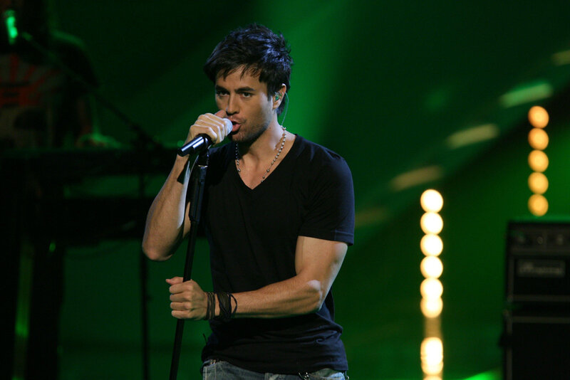 Man Singing on Stage — Green, Energetic