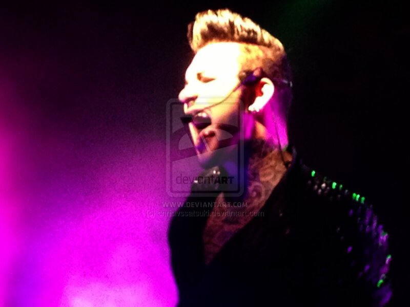 Man Singing on Stage — Purple, Dramatic, Night, Photograph