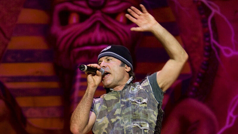 Man Singing on Stage — Purple, Energetic