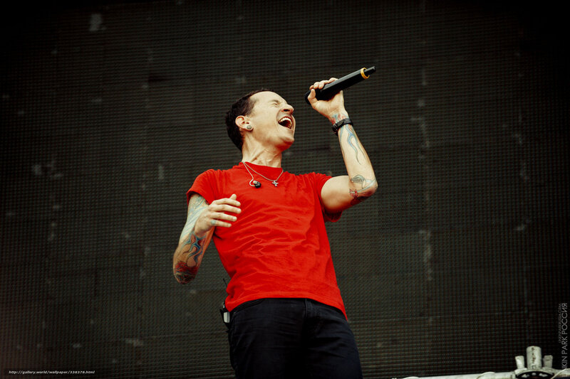 Man Singing on Stage — Red, Energetic, Photograph