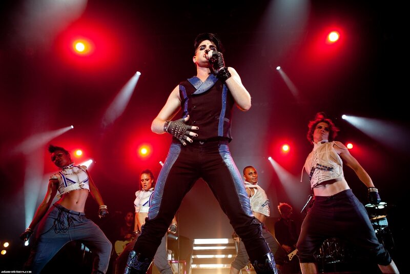 Man Singing on Stage — Red, Energetic