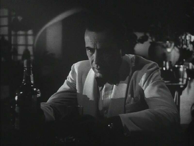 man sitting at a bar
