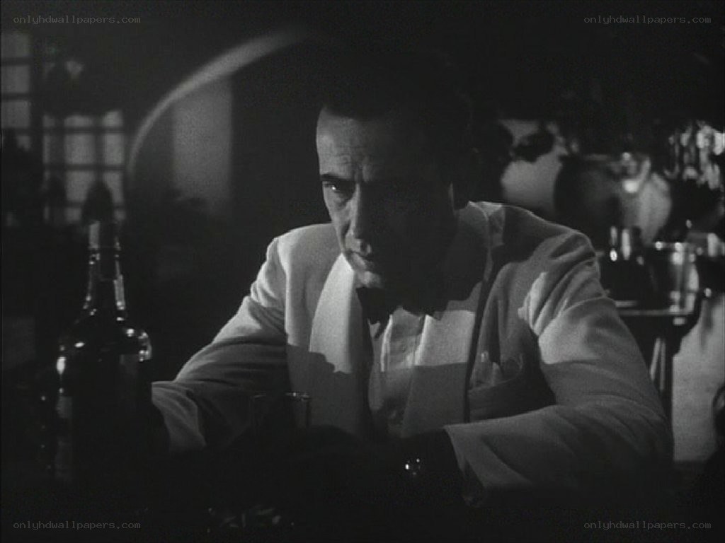 man sitting at a bar
