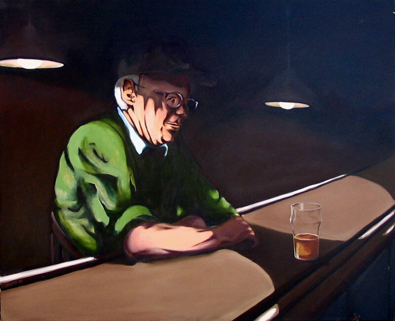 man sitting at a bar